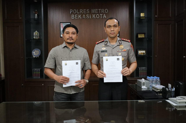 Penandatanganan kerja sama Kapolres Metro Bekasi Kota, Kombes Pol Putu Kholis Aryana, bersama Direktur PT Sentosa Garmindo Pratama, Ananda Kurnia Utama, Senin (19/10/2026). Foto: Polres Metro Bekasi Kota