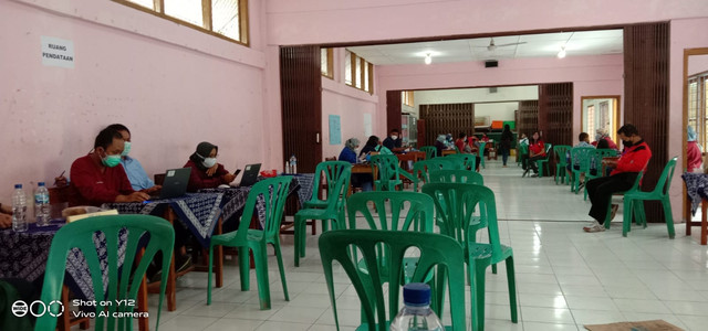 Foto: Kegiatan masa vaksinasi yang dilakukan oleh SD Muhammadiyah Balecatur yang bertempat di SD Negeri Gamol pada hari Sabtu (15/01). /SD Muhammadiyah