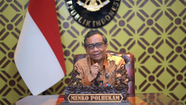 Menko Polhukam Mahfud MD hadiri Webinar G20 yang digelar KPK, Jumat (4/3/2022). Foto: Humas Kemenko Polhukam
