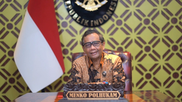 Menko Polhukam Mahfud MD hadiri Webinar G20 yang digelar KPK, Jumat (4/3/2022). Foto: Humas Kemenko Polhukam