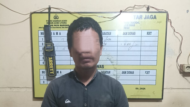 Pria berinisial AR (29), seorang warga di Kabupaten Aceh Utara yang diduga membacok rekannya berinisial MJ (42) pada Jumat (15/4/2022). Foto: Dok. Polres Aceh Utara