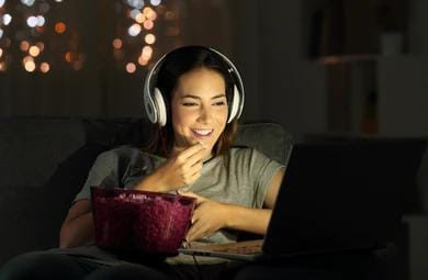 https://www.shutterstock.com/id/image-photo/single-woman-watching-online-tv-night-1144818344