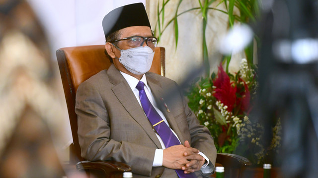 Menteri Koordinator Bidang Politik, Hukum, dan Keamanan, Mahfud MD dalam acara penyampaian Laporan Tahunan Komisi Yudisial Tahun 2021 di Istana Negara, Jakarta (9/3). Foto: Muchlis Jr/Biro Pers Sekretariat Presiden