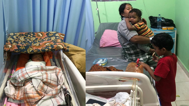SY, ISTRI tersangka pencurian sepeda motor, RH, bersama dua anaknya serta bayi baru lahir saat suaminya ditangkap Tim The Power of Hand, Kamis malam ( 7/4/2022). (FOTO: SELASAR RIAU/POLRES ROKAN HULU)