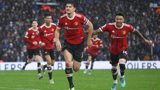 Pemain Manchester United Harry Maguire melakukan selebrasi usai mencetak gol pertama saat melawan Leeds United di Elland Road, Leeds, Inggris. Foto: Russell Cheyne/Reuters
