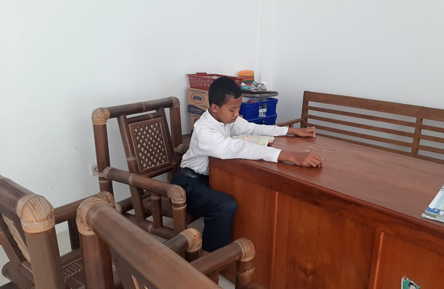 Tilawah Al-Quran oleh santri Panti Asuhan Muhmmadiyah Ahmad Dahlan Kokap. (Sumber : PDD KKN MH 005 UMY).