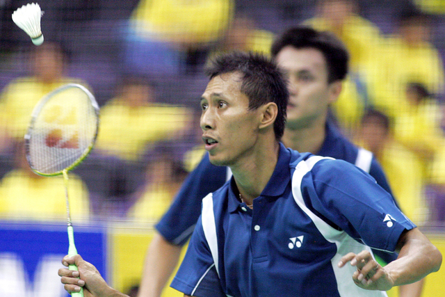 Ganda putra Indonesia Sigit Budiarto bersama pasangannya Chandra Wijaya saat Singapura Terbuka, pada 3 Juli 2005. Foto: Tim Chong/REUTERS