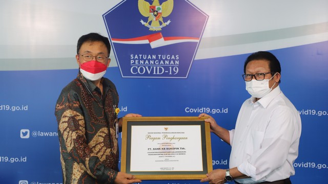 KB Kookmin Bank dan KB Bukopin Donasikan 400.000 masker ke BNPB. Foto: Dok. Istimewa