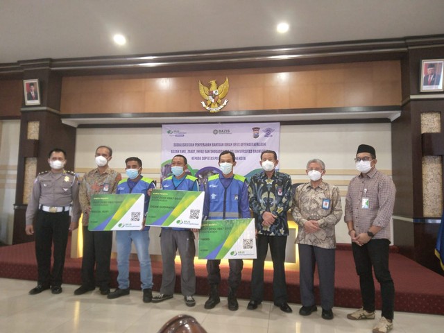 Suasana Sosialisasi dan Penyerahan Bantuan Iuran BPJS Ketenagakerjaan Badan Amil, Zakat, Infaq, dan Shodaqoh (Bazis) Universitas Brawijaya kepada Supeltas Polresta Malang Kota. Foto: Feni Yusnia