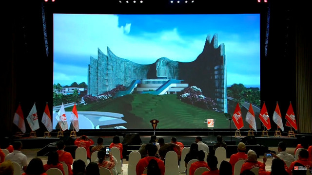 Presiden Jokowi tunjukkan desain Ibu Kota Baru di acara Puncak HUT ke-7 Partai Solidaritas Indonesia, Rabu (22/12). Foto: Youtube/PSI