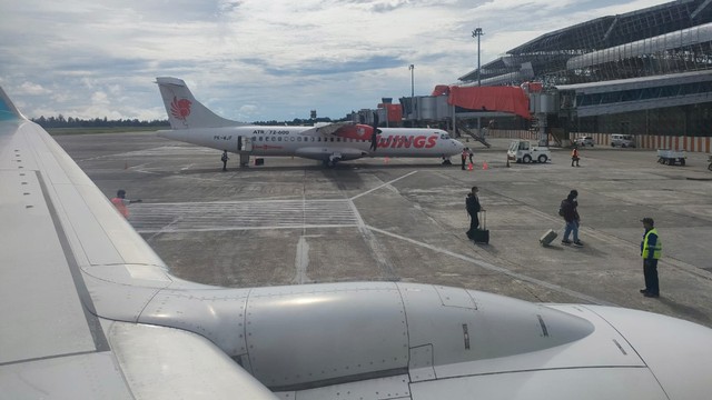 Maskapai penerbangan di Bandara Sentani Jayapura. (BumiPapua.com/Katharina) 
