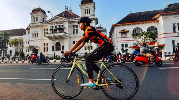 Ilustrasi goweser melaju di titik nol Jogja. Foto: Dok. UGM