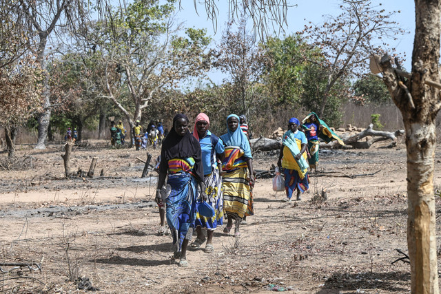 Pengungsi Burkina Faso terlihat di tempat penampungan di Tougbo, Pantai Gading, pada 22 Januari 2022.  Foto: Sia KAMBOU / AFP
