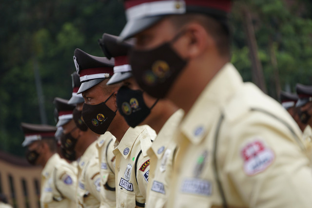 Upacara Hari Ulang Tahun Ke-41 Satpam di Lapangan Bhayangkara, Rabu 2 Febuari 2022. Foto: Jamal Ramadhan/kumparan