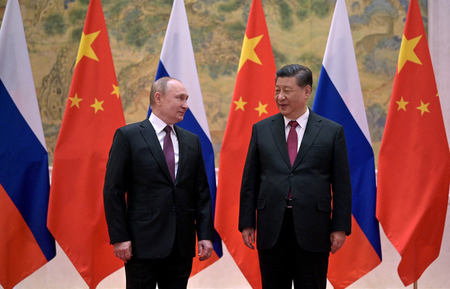 Pertemuan Vladimir Putin dengan Xi Jinping di Beijing. Foto: Sputnik/Aleksey Druzhinin/Kremlin via REUTERS