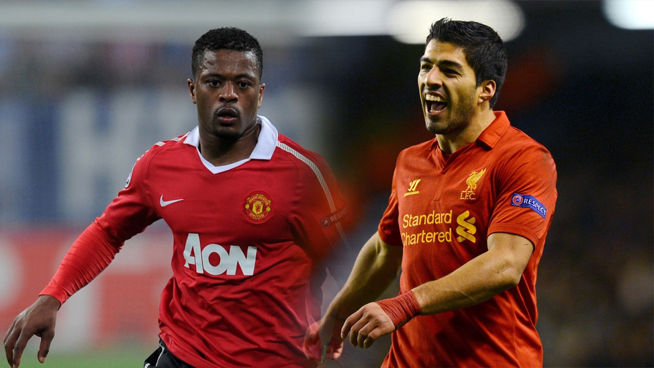 Patrice Evra dan Luiz Suarez
