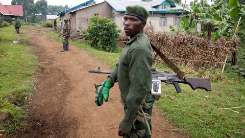 Anggota milisi M23 di Bunagana, Kongo pada tanggal 7 Juni 2012. Foto: Michele Sibiloni/AFP