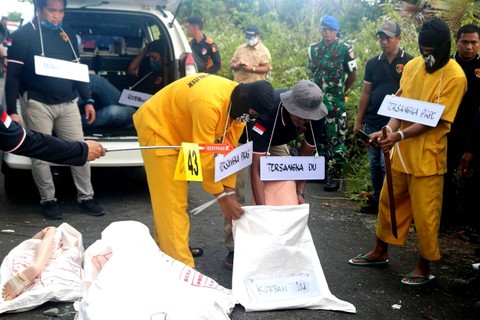 Rekonstruksi kasus mutilasi di Papua yang melibatkan prajurit TNI, Sabtu (3/9/2022). Foto: Dok. Istimewa