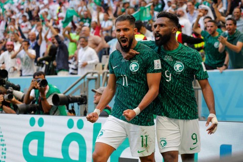 Selebrasi pemain Timnas Arab Saudi usai menceak gol ke gawang Timnas Argentina pada pertandingan Grup C Piala Dunia 2022 Qatar di Stadion Lusail, Lusail, Qatar.   Foto: Odd ANDERSEN / AFP