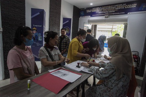 Foto: Jelang Libur Nataru, Permohonan Pembuatan Paspor Meningkat