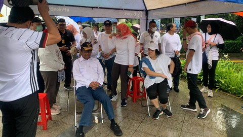 Menkopolhukam, Mahfud MD dan Ketua Komnas HAM Atnike Nova Sigiro hadiri acara pawai mendorong perencanaan UU PRRT, Jalan Sudirman, Jakarta, Minggu (12/2/2023). Foto: Luthfi Humam/kumparan