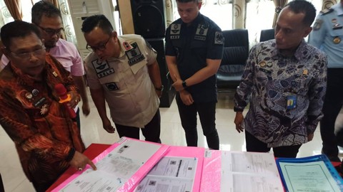 Barang bukti perkara, dokumen kewarganegaraan MN. Dok: Ist.