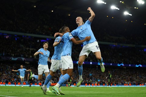Selebrasi pemain Manchester City usai mencetak gol gawang Real Madrid pada pertandingan leg kedua semifinal Liga Champions di Etihad Stadium, Manchester, Inggris, Kamis (18/5/2023).  Foto: Molly Darlington/REUTERS