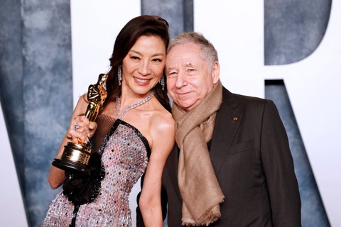 Michelle Yeoh dan Jean Todt. Foto: Michael TRAN / AFP