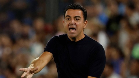 Xavi Hernandez saat laga Getafe vs Barcelona dalam pekan perdana Liga Spanyol 2023/24 di Coliseum Alfonso Perez, Senin (14/8) dini hari WIB. Foto: JAVIER SORIANO / AFP