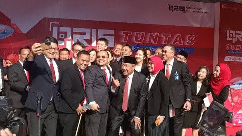 Gubernur BI Perry Warjiyo saat launching QRIS Tuntas di Komplek Bank Indonesia, Kamis (17/8/2023). Foto: Akbar Maulana/kumparan