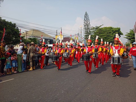 Penampilan kirab marching band dalam rangka perayaan HUT ke-78 RI. | Foto : Galih Prihantoro/ Lampung Geh