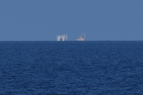 Ilustrasi laut China Selatan. Foto: Ted ALJIBE / AFP