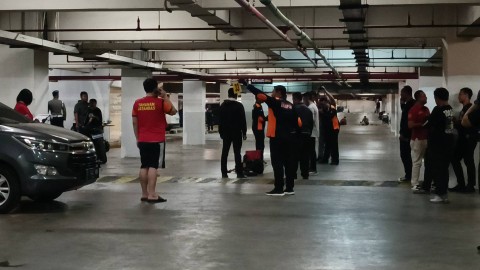 Polisi melakukan rekonstruksi kasus penganiayaan dengan tersangka R yang merupakan putra seorang anggota DPR RI di parkiran bawah tanah Lenmarc Mall, Surabaya, Jawa Timur, Selasa (10/10/2023). Foto: Farusma Okta Verdian/kumparan