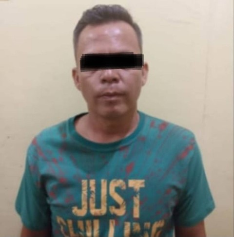 Pria bernama Umar Hadi yang ditangkap karena cabuli anak tirinya sendiri. (ist)