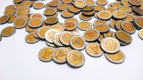 Ilustrasi uang koin pecahan Rp 1000. Foto: Shutterstock
