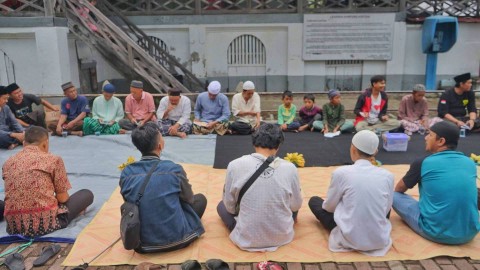 Puluhan warga yang tinggal di sekitar destinasi cagar budaya yang ikut tradisi budaua sesekah kampung tahunan di Palembang, Sabtu (23/12) Foto: abp/urban id