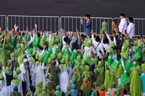 Presiden Joko Widodo hadir di Harlah ke-78 Muslimat NU di GBK Senayan, Jakarta, Sabtu (20/1). Foto: Jamal Ramadhan/kumparan