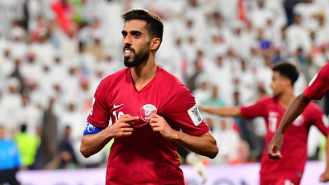Penyerang Qatar Hasan Al Haydos merayakan golnya pada pertandingan sepak bola semifinal Piala Asia AFC 2019 antara Qatar dan UEA di Stadion Mohammed Bin Zayed di Abu Dhabi pada 29 Januari 2019. Foto: Giuseppe Cacace/AFP