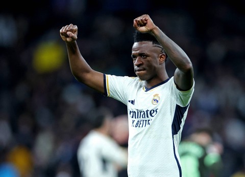 Vinicius Junior dari Real Madrid melakukan selebrasi usai pertandingan di Santiago Bernabeu, Madrid, Spanyol. Foto: Isabel Infantes/Reuters