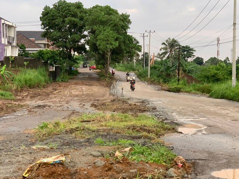 Jalan Teuku Cik Ditiro pasca diterjang banjir, Minggu (10/3/2024) | Foto: Roza Hariqo / Lampung Geh