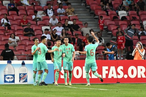 Pemain Timnas China saat melawan Qatar pada pertandingan Grup A Piala Asia AFC Qatar 2023 di Stadion Internasional Khalifa di Doha, Qatar pada 22 Januari 2024. Foto: KARIM JAAFAR / AFP