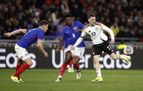 Prancis vs Jerman di laga uji coba. Foto: Benoit Tessier/REUTERS