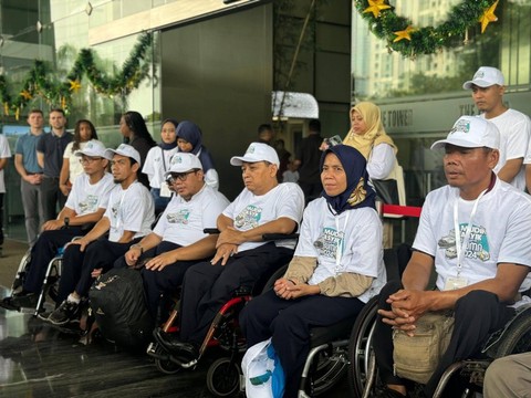 Teman disabilitas mengikuti mudik gratis BSI. Foto: kumparan