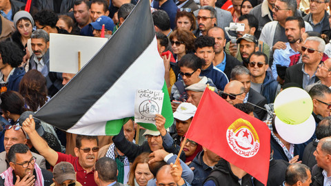 Bendera Palestina Penuhi Aksi May Day di Tunisia Foto: AFP