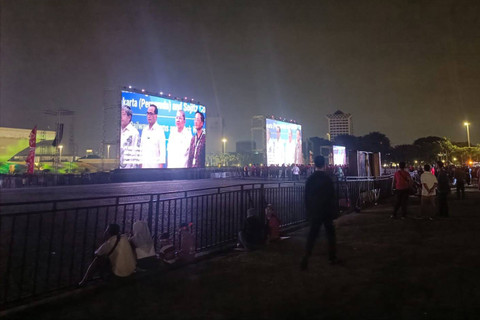 Suasana jelang nonton bareng Timnas Indonesia U-23 melawan Irak di Monas, Jakarta, Kamis (2/5/2024). Foto: Zamachsyari/kumparan