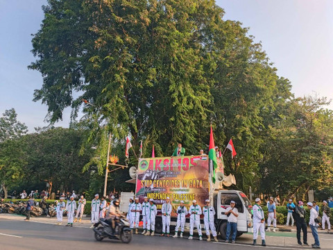 Aksi Bela Palestina depan kedutaan besar Amerika Serikat di kawasan Monas, Jakarta Pusat, Minggu (19/5).  Foto: Hedi/kumparan