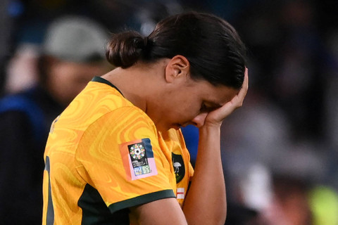 Reaksi pemain Australia Sam Kerr di akhir pertandingan sepak bola semifinal Piala Dunia Wanita Australia dan Selandia Baru 2023 antara Australia dan Inggris di Stadion Australia di Sydney pada 16 Agustus 2023. Foto: Franck Fife/AFP