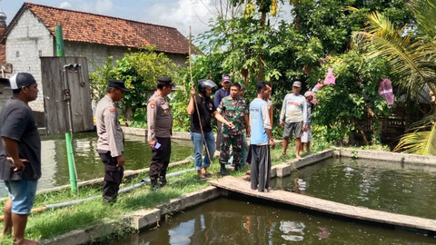 Kolam ikan di Dusun Ngipik, Desa Bono, Kecamatan Boyolangu, Kabupaten Tulungagung, lokasi tiga bocah yang tercebur. Foto: Dok. Polres Tulungagung