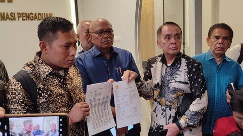 Staf Sekjen PDIP Hasto Kristiyanto, Kusnadi  resmi melapor ke Kantor Komnas HAM pada Rabu (12/6/2024). Foto: Rachmadi Rasyad/kumparan