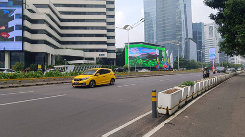 Kawasan Jalan Sudirman dan Bundaran HI tampak lengang di long weekend Idul Adha, Sabtu (15/6). Foto: Fadlan Nuril Fahmi/kumparan